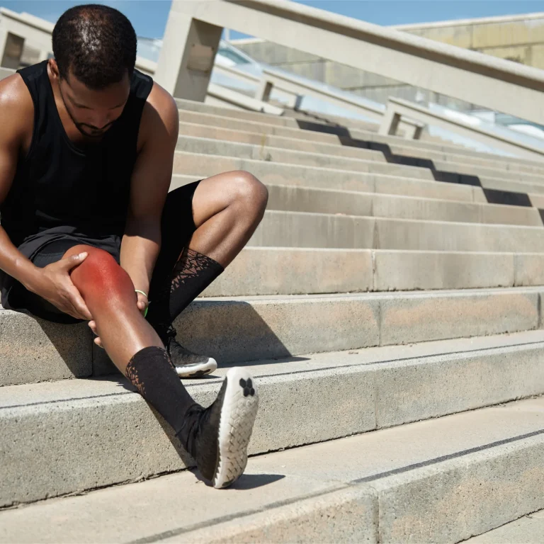 closeup-young-man-with-knee-injury